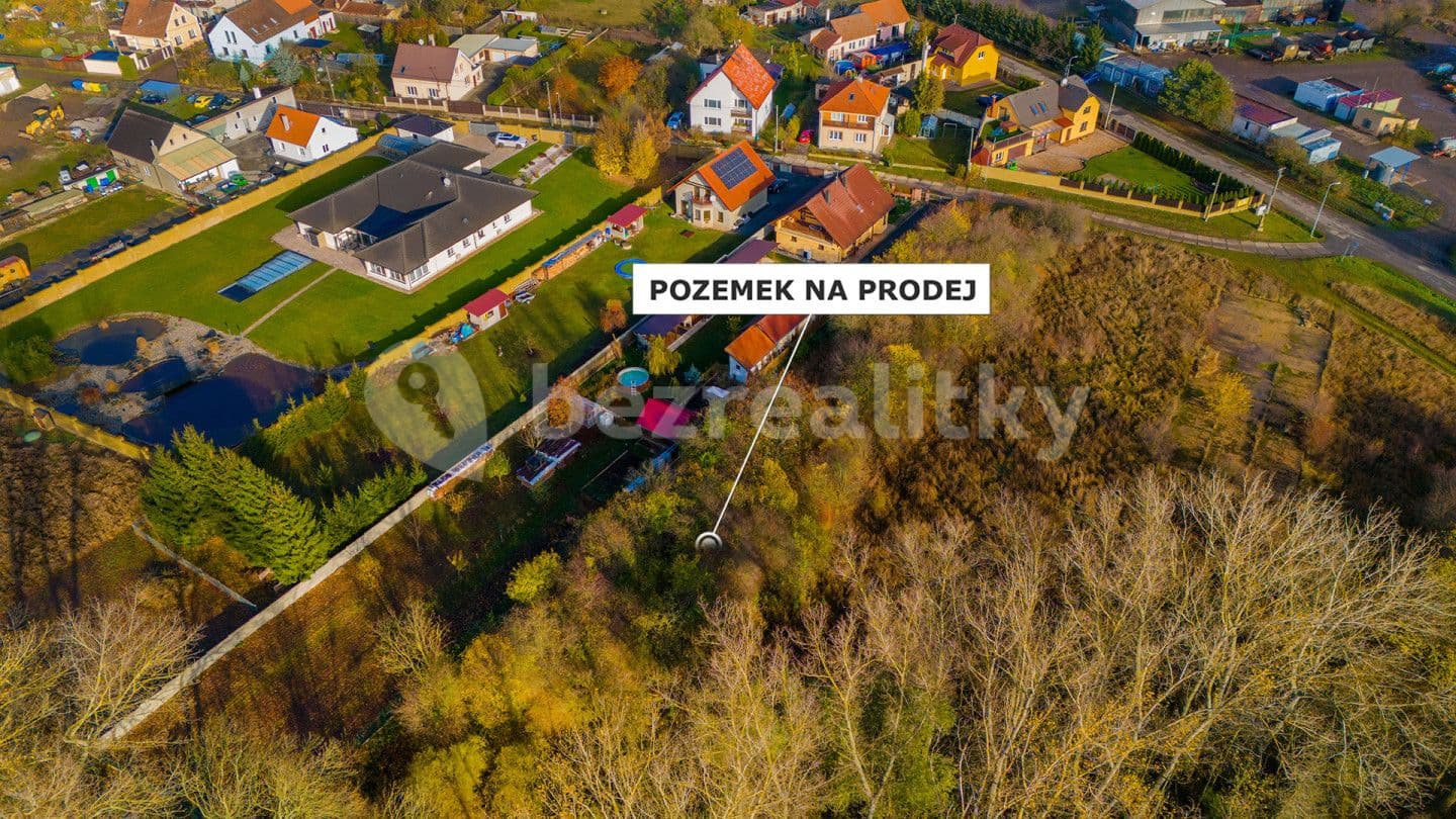 Prodej pozemku 2.111 m², Nesuchyně, Středočeský kraj