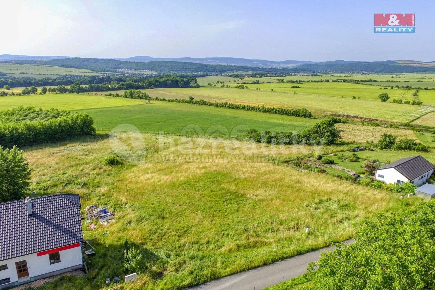 Prodej pozemku 1.041 m², Lhotka, Středočeský kraj