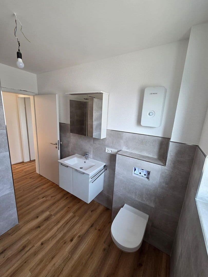 Pronájem bytu 2+1 65 m², Am Guldenbach 60a-60b, Rheinböllen, Porýní-Falc Pronájem bytu 2+1 65 m², Am Guldenbach 60a-60b, Rheinböllen, Porýní-Falc